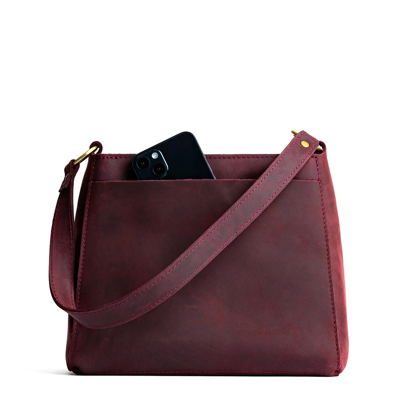 Merlot | Triangular shoulder bag with antiqued brass finished hardware