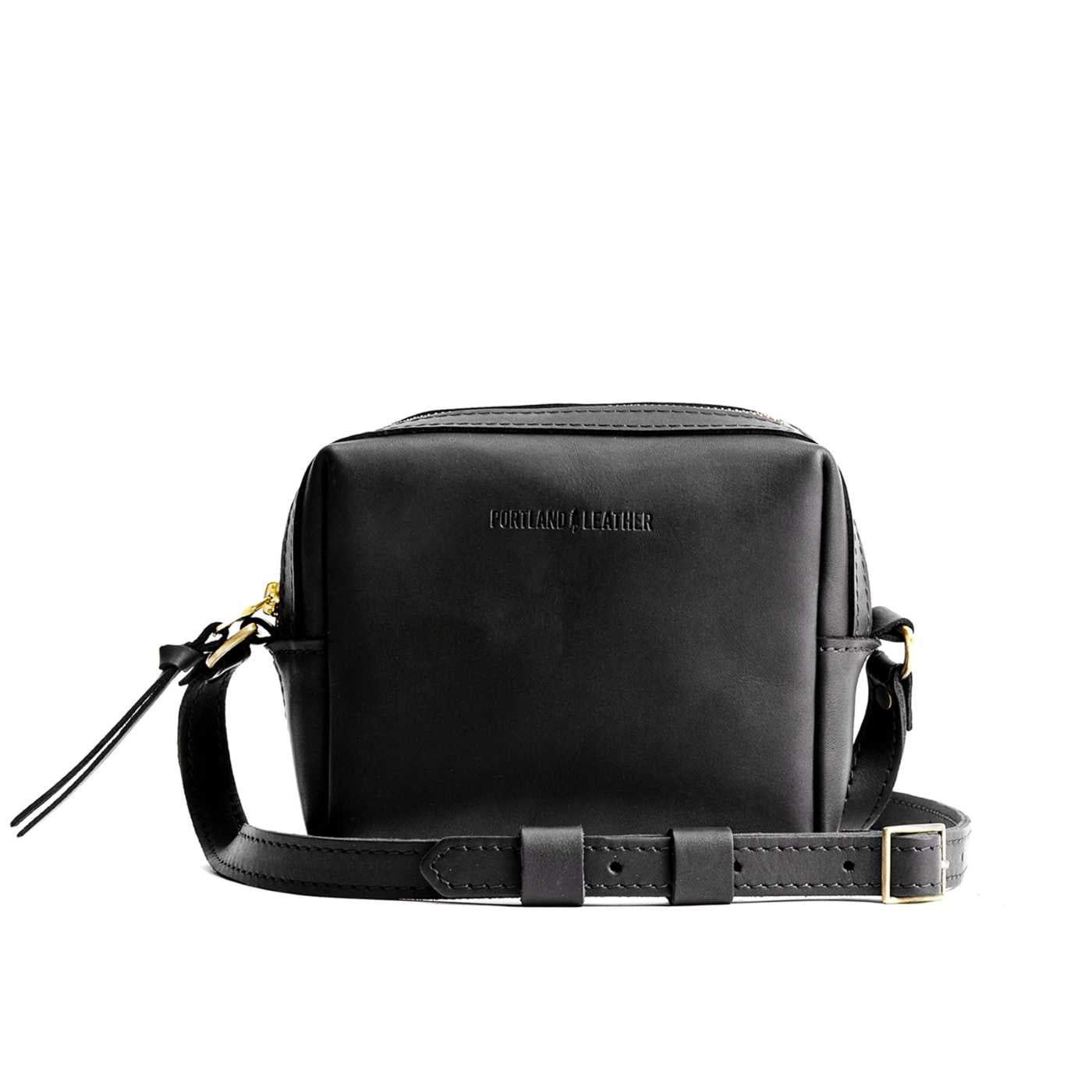 Black | Square crossbody bag with top zipper and leather pull tab