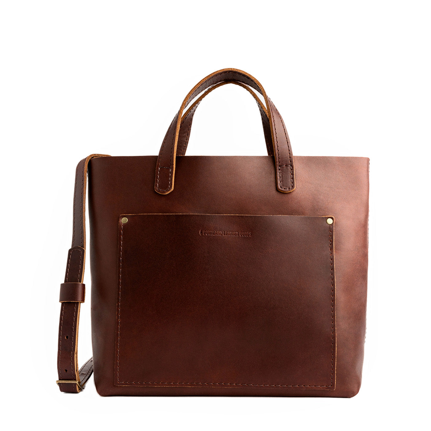 Cognac Classic | Midsize crossbody tote with handles and a pocket