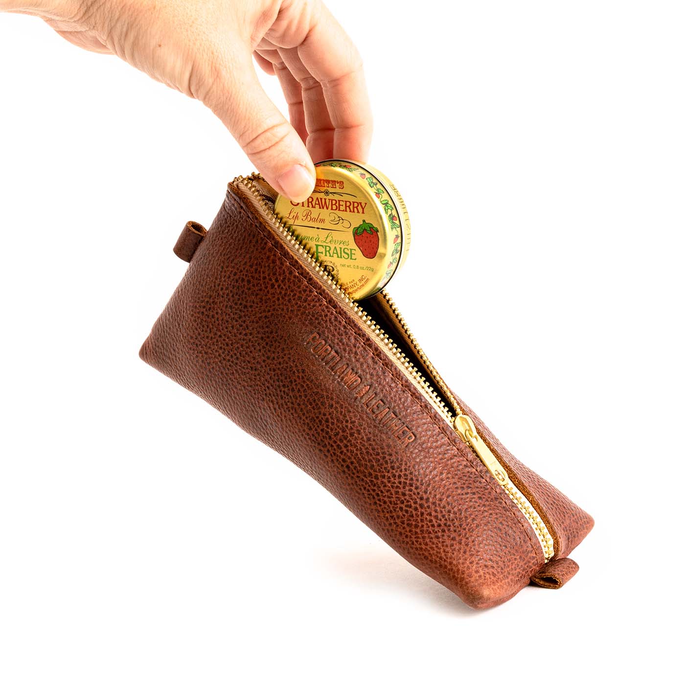 All Color: Nutmeg | Small leather triangular zip pouch