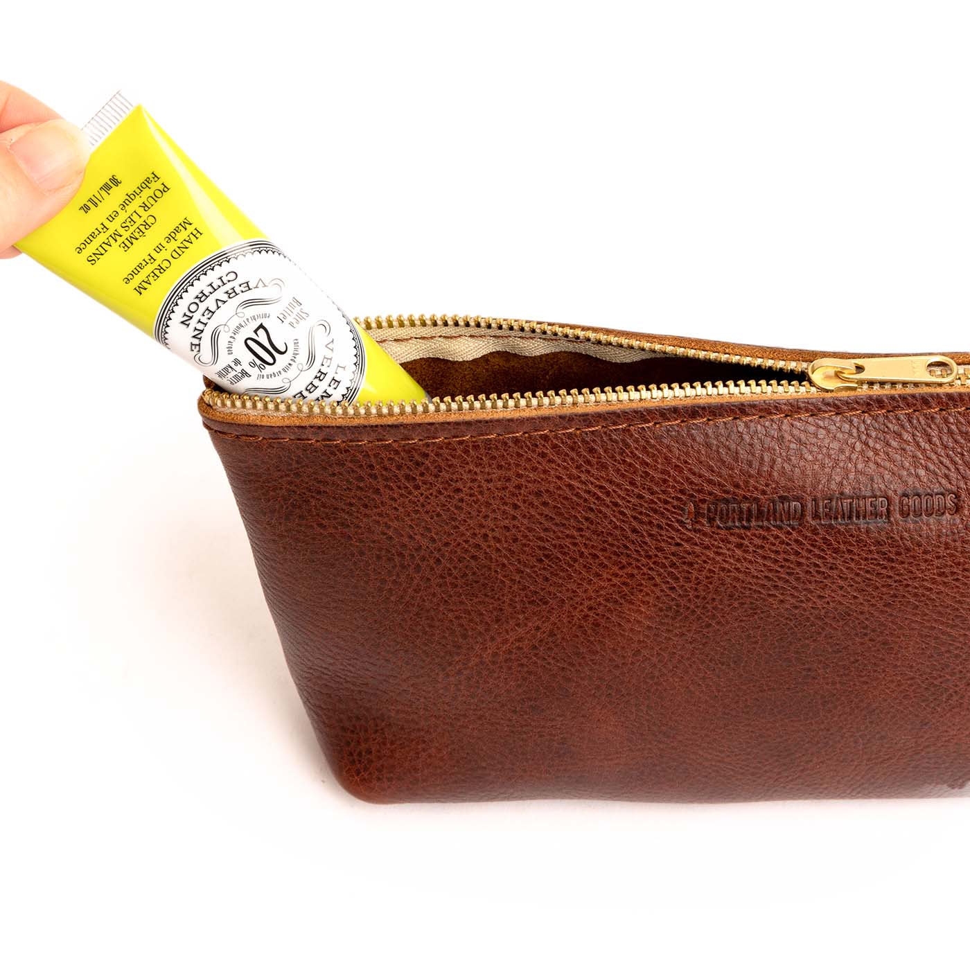 All Color: Nutmeg | Leather utility bag pouch with top zipper