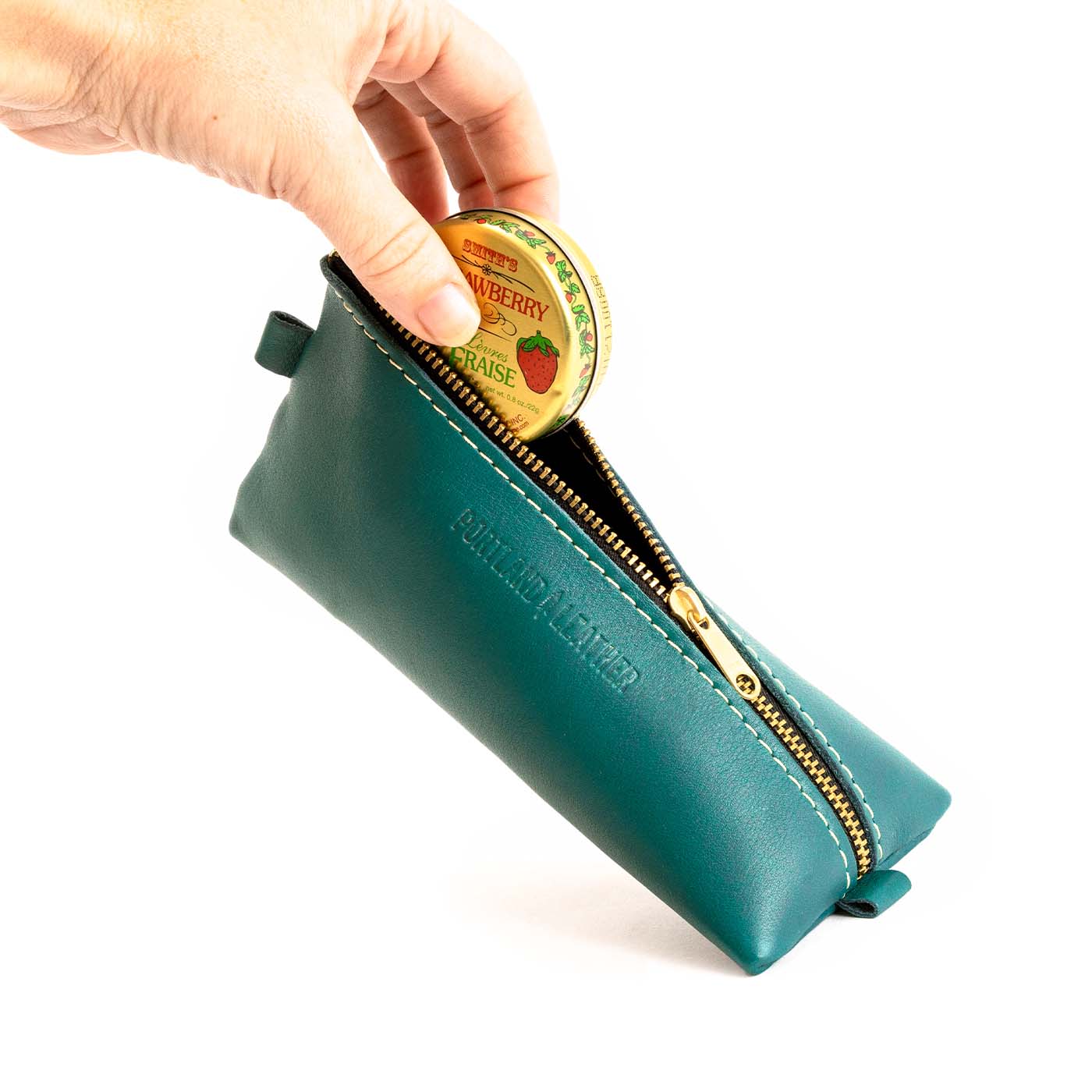 All Color: Peacock | Small leather triangular zip pouch