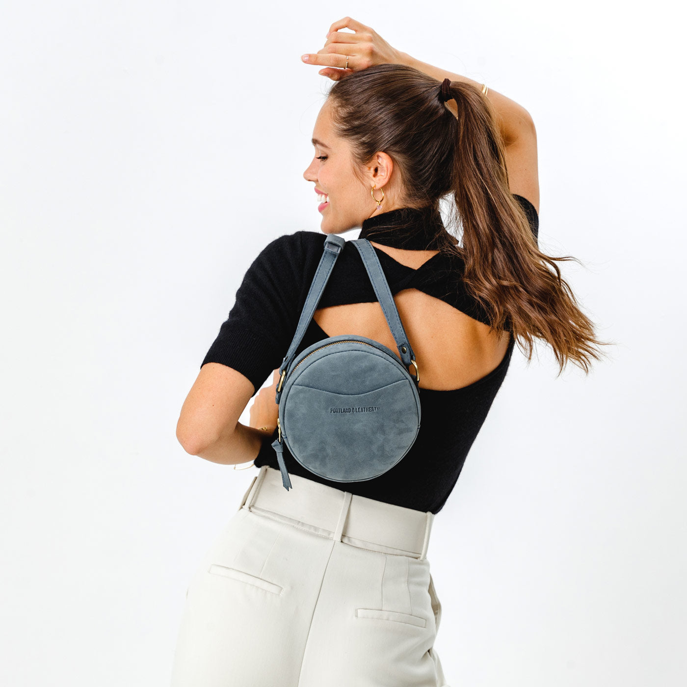 Storm Small | Circle shaped crossbody bag with top zipper