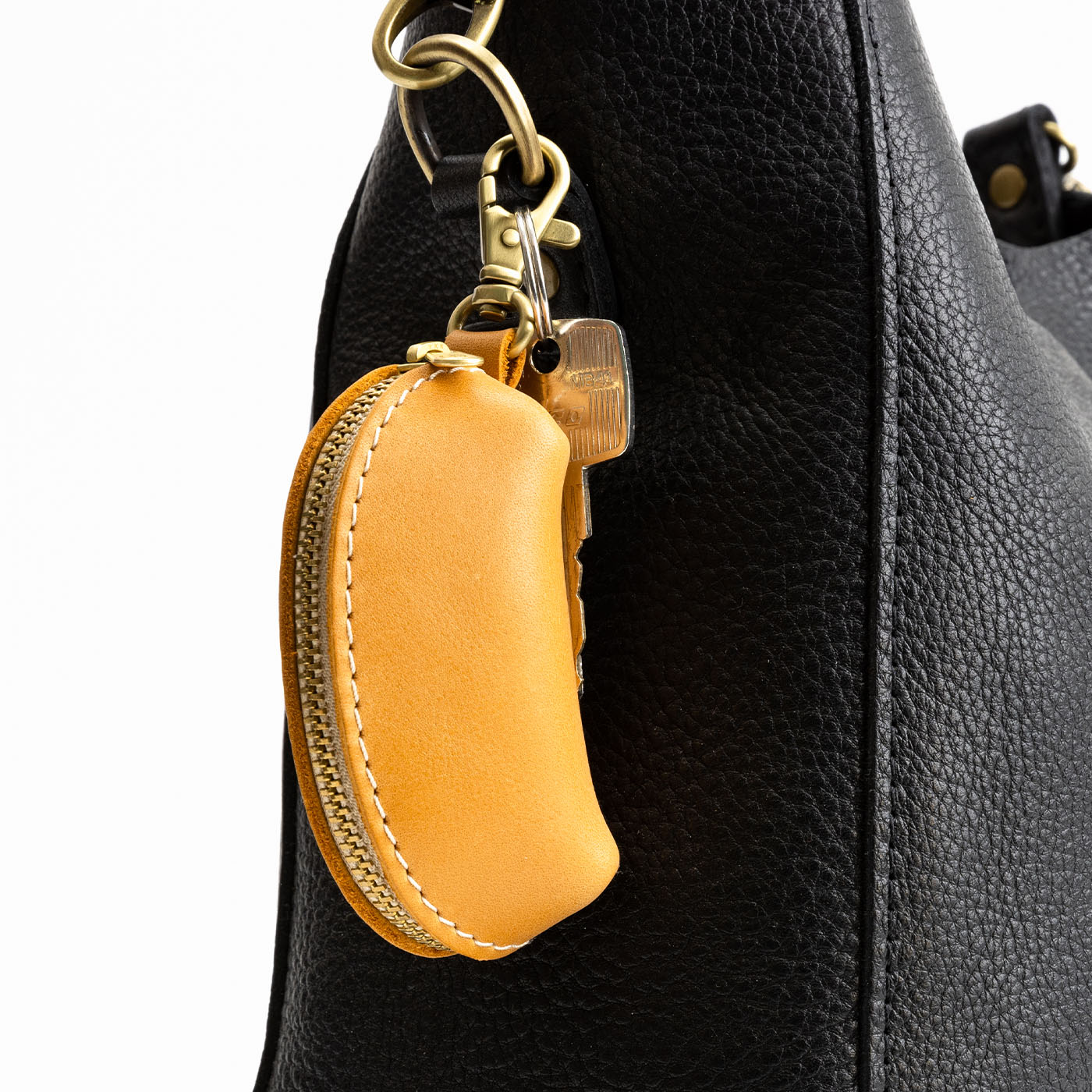 All Color: Sunflower | Small taco shaped pouch, swivel lobster clasp