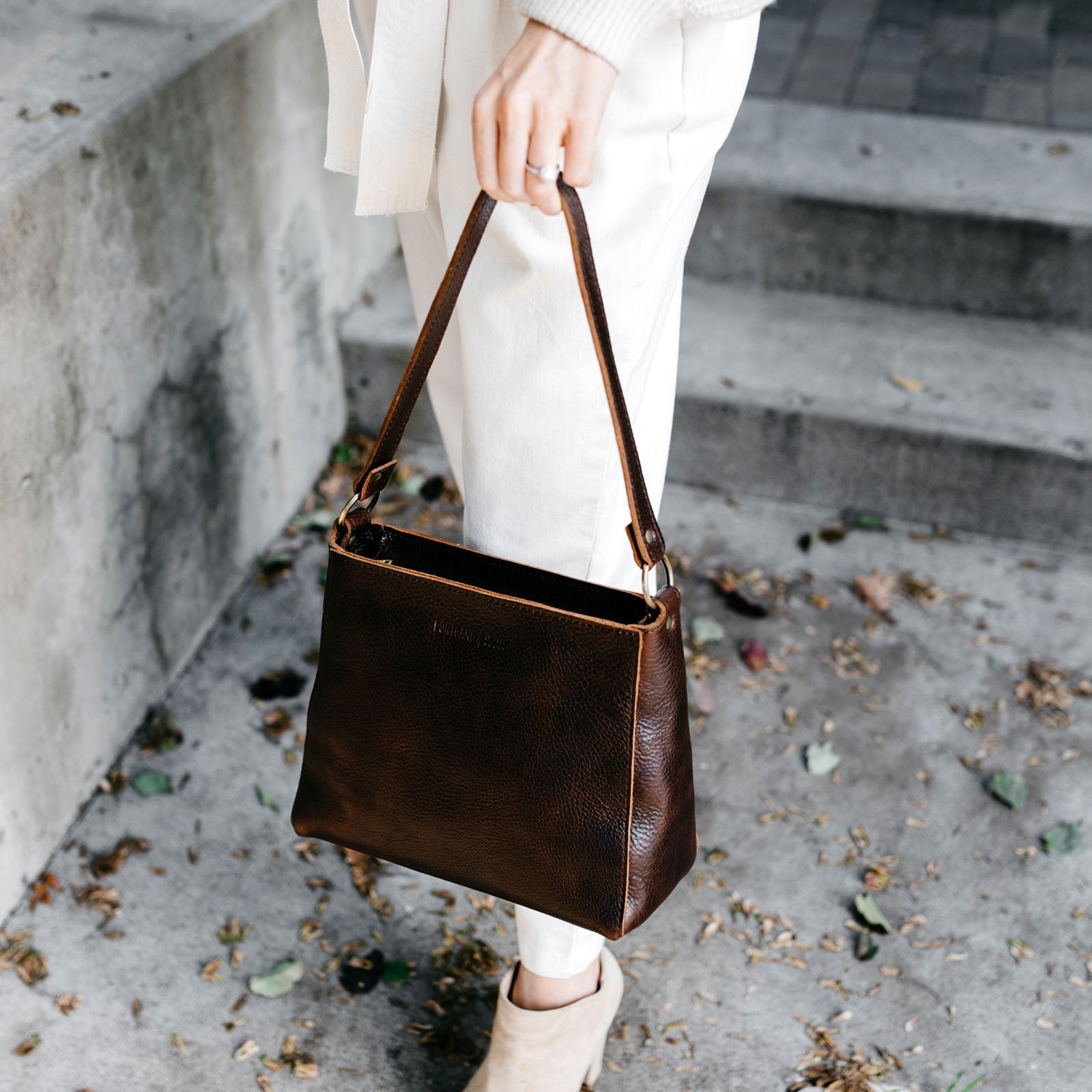 Coldbrew | Triangular shoulder bag with antiqued brass finished hardware